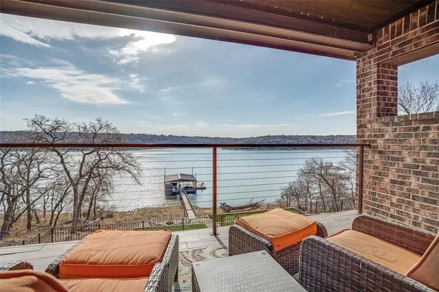 a outdoor living space with furniture and city view