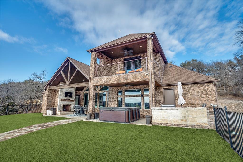 181 Ridgeline Drive Chico, TX 76431 - Photo 29 of 39 a front view of a house with a yard