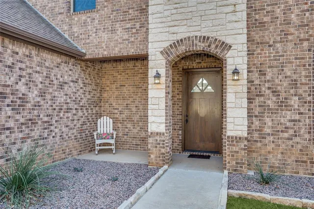 a front view of a house with a door