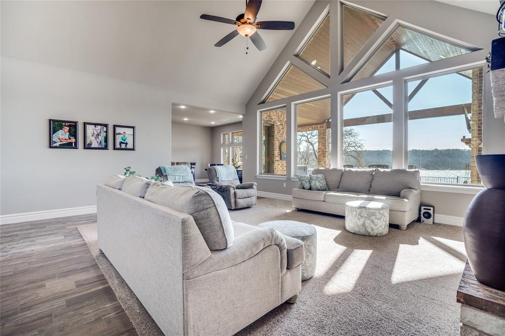181 Ridgeline Drive Chico, TX 76431 - Photo 4 of 39 a living room with furniture and a large window