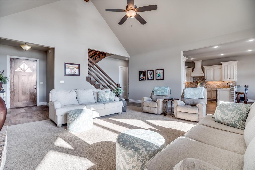 181 Ridgeline Drive Chico, TX 76431 - Photo 7 of 39 a living room with furniture and a large mirror