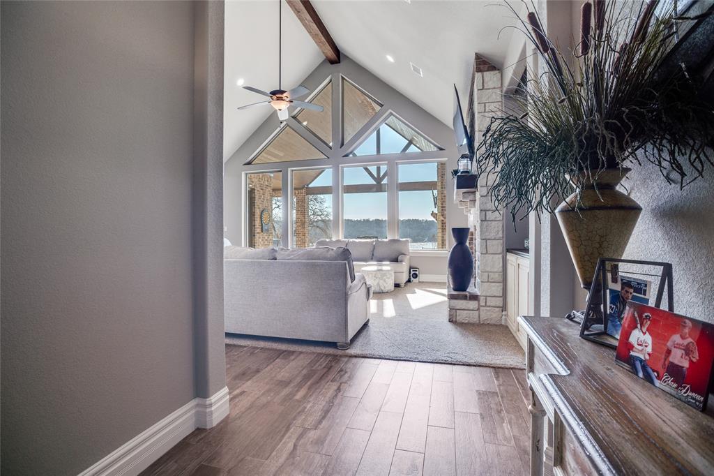 181 Ridgeline Drive Chico, TX 76431 - Photo 8 of 39 a living room with furniture and a flat screen tv