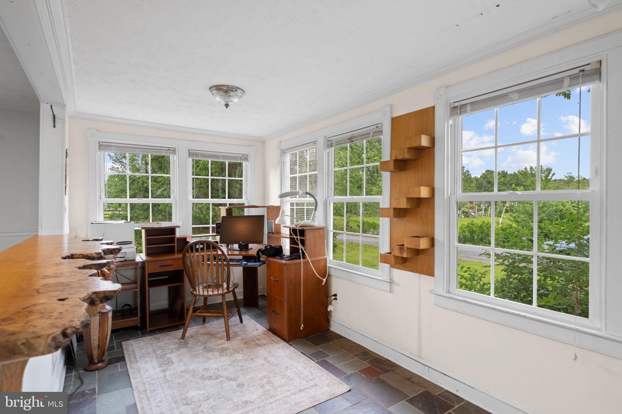 669 Dicks Hollow Road Winchester, VA 22603 - Photo 6 of 51 front sun room