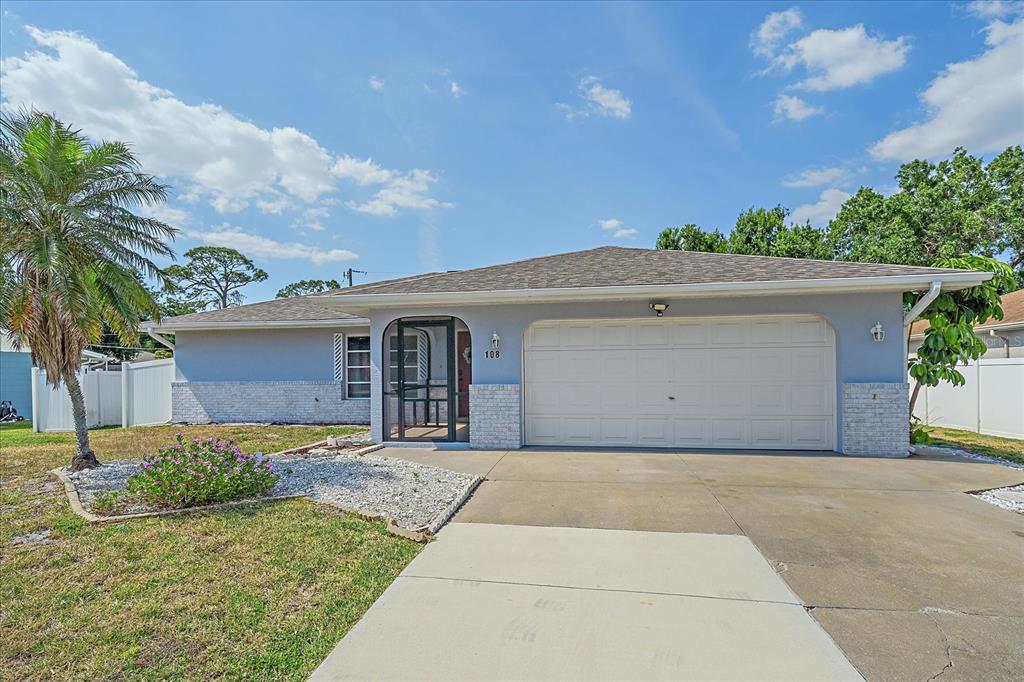 a house view with a garden space