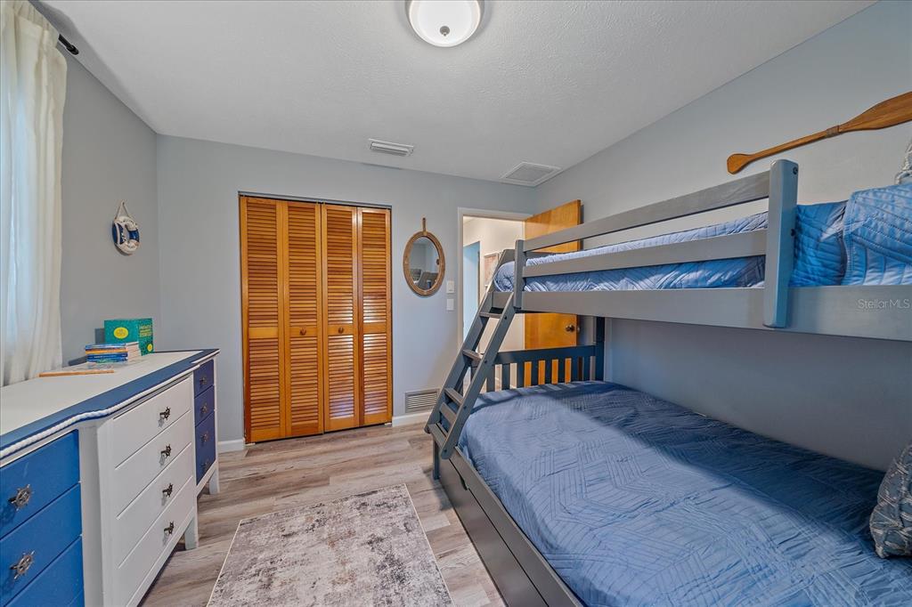 108 Stanford Road Venice, FL 34293 - Photo 19 of 28 a bedroom with a bed and a window