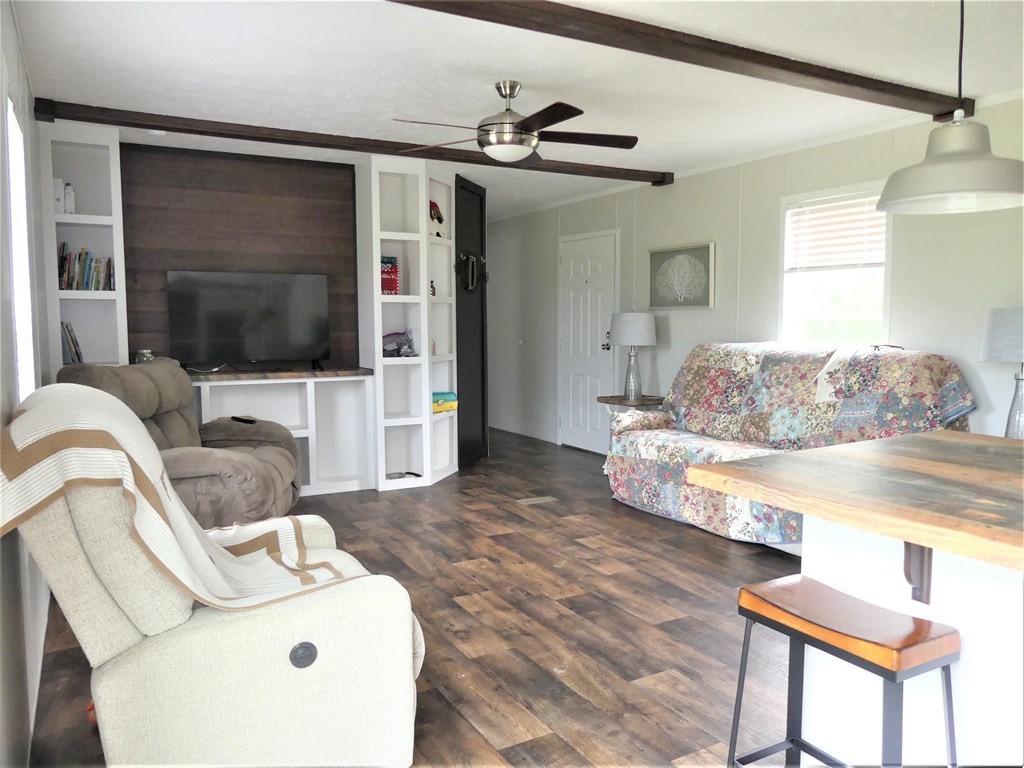 211 Cottonport Ferry Road Decatur, TN 37322 - Photo 11 of 41 a living room with furniture and a flat screen tv