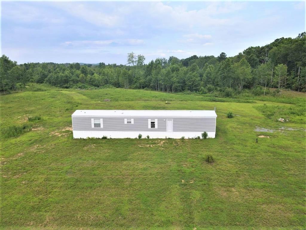 211 Cottonport Ferry Road Decatur, TN 37322 - Photo 2 of 41 a view of a big yard with green space