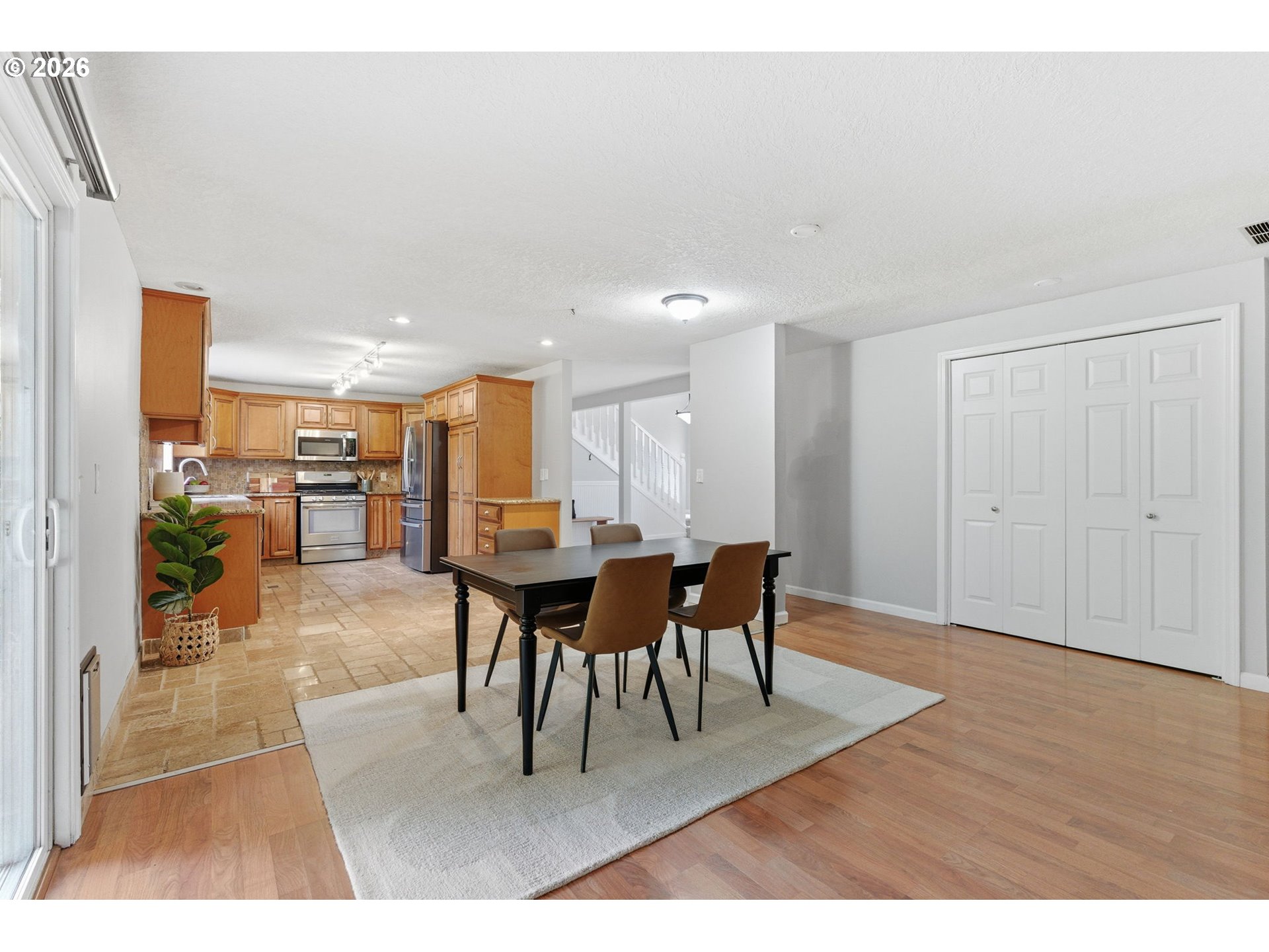 5585 Northwest Peregrine Place Portland, OR 97229 - Photo 11 of 47 a view dining room with furniture