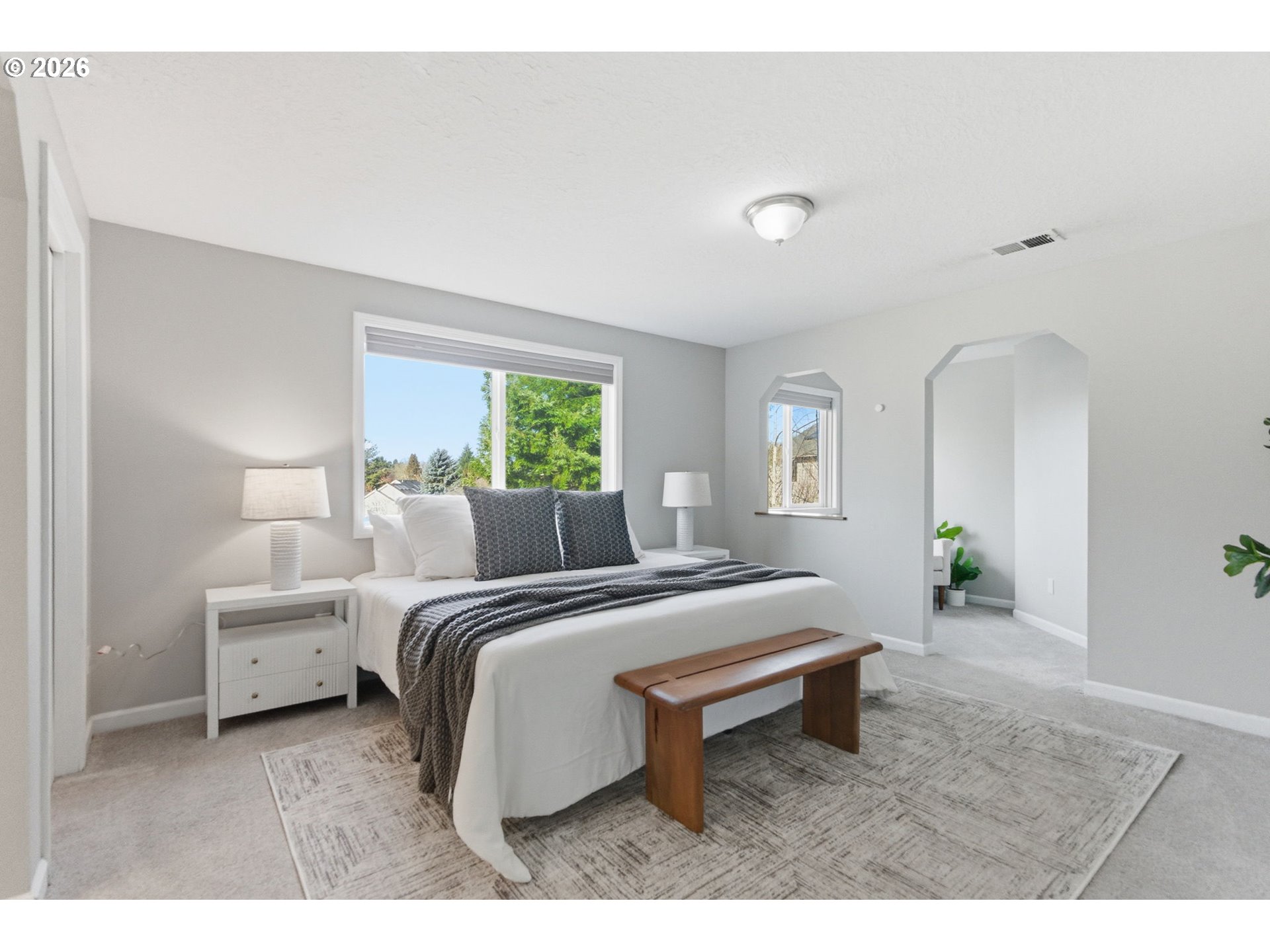 5585 Northwest Peregrine Place Portland, OR 97229 - Photo 29 of 47 a bed room with a bed and a window