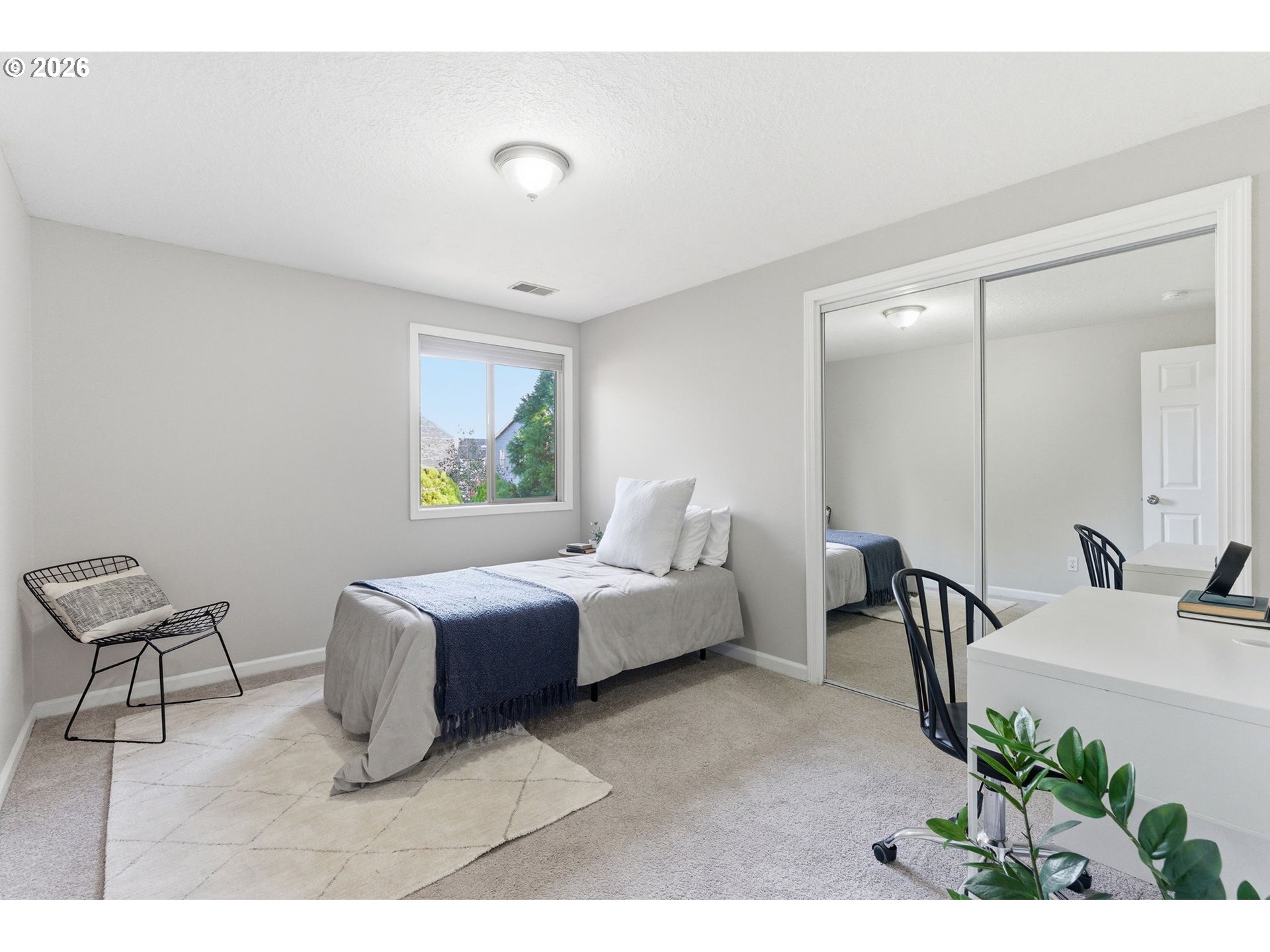 5585 Northwest Peregrine Place Portland, OR 97229 - Photo 34 of 47 a living room with furniture and a potted plant