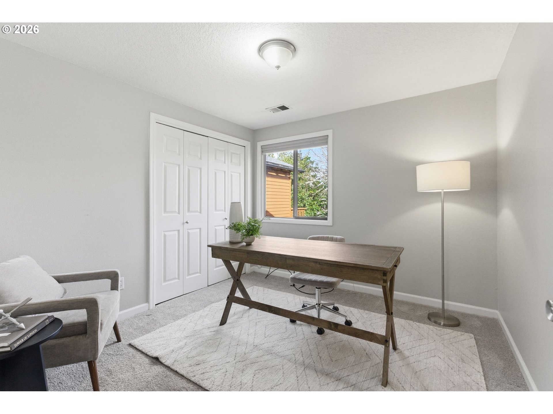 5585 Northwest Peregrine Place Portland, OR 97229 - Photo 35 of 47 a living room with furniture and a window