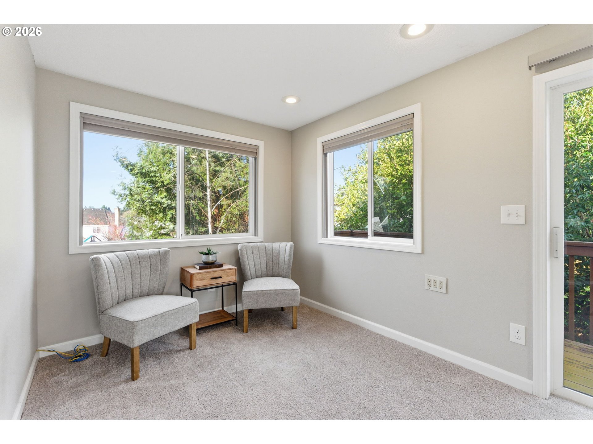 5585 Northwest Peregrine Place Portland, OR 97229 - Photo 40 of 47 a living room with furniture and a window