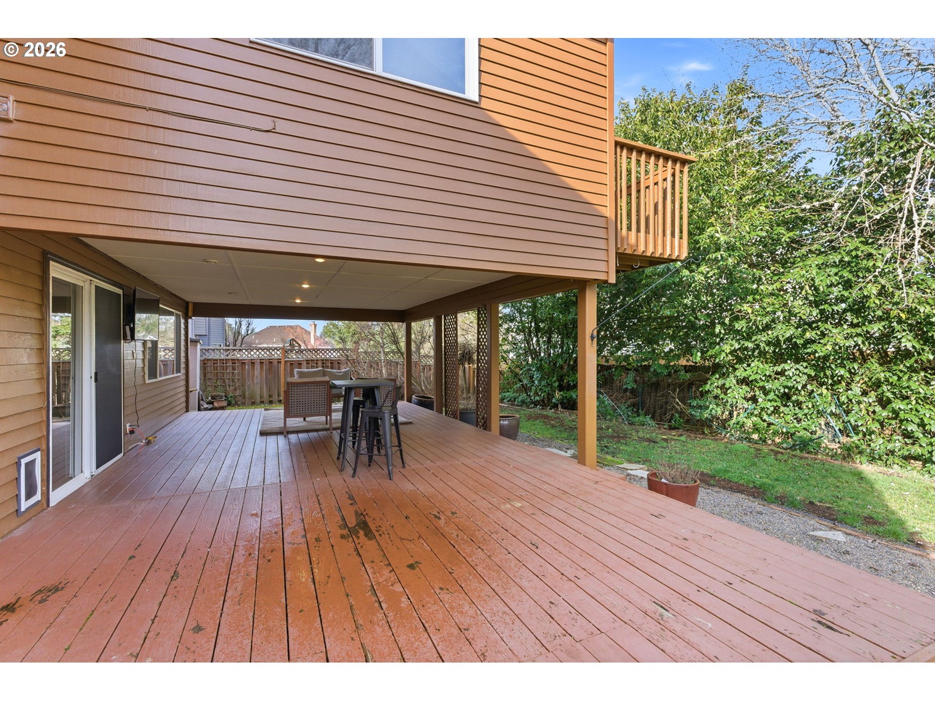 5585 Northwest Peregrine Place Portland, OR 97229 - Photo 43 of 47 a view of a patio with wooden floor