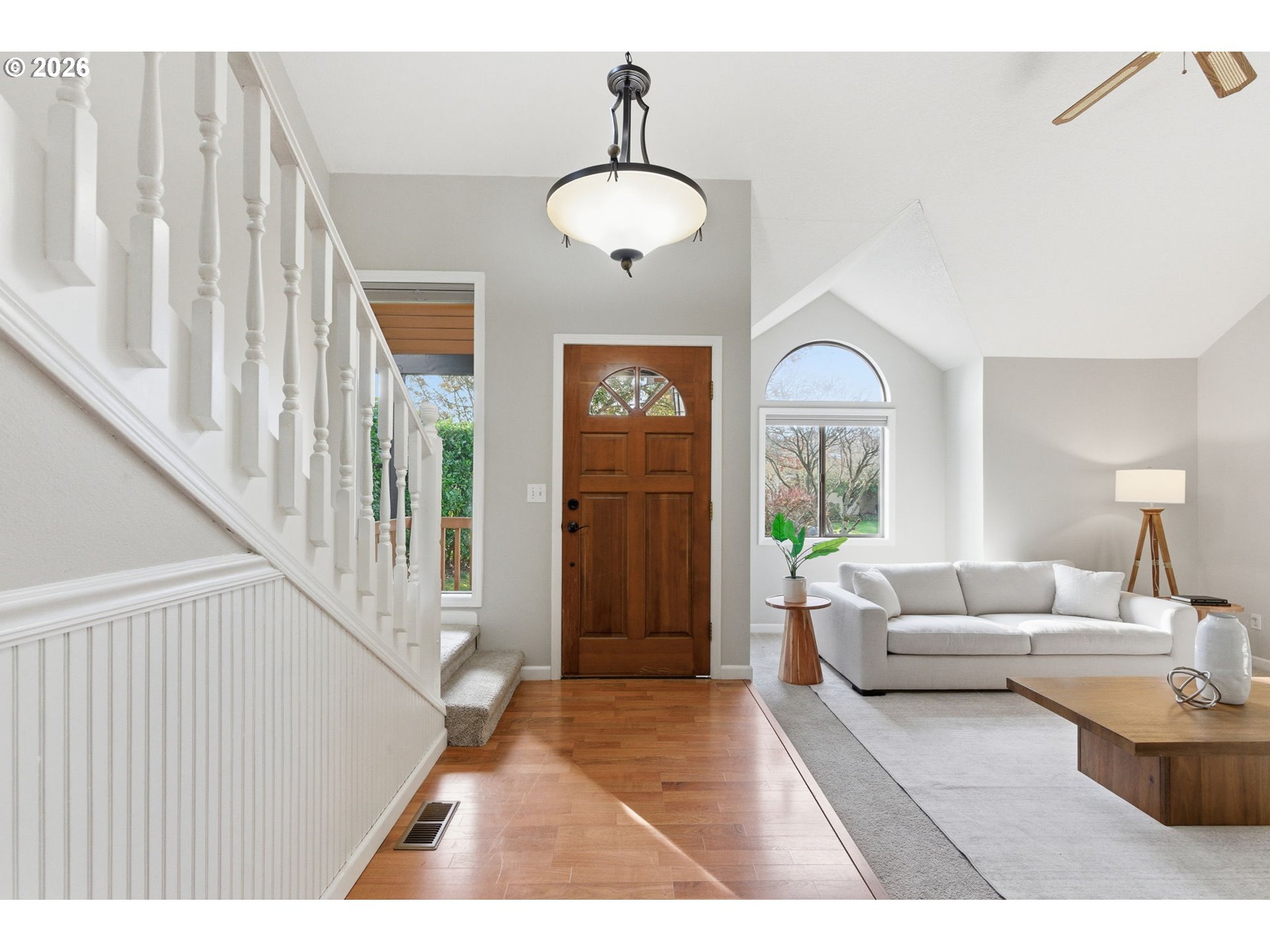 5585 Northwest Peregrine Place Portland, OR 97229 - Photo 5 of 47 a living room with furniture and wooden floor