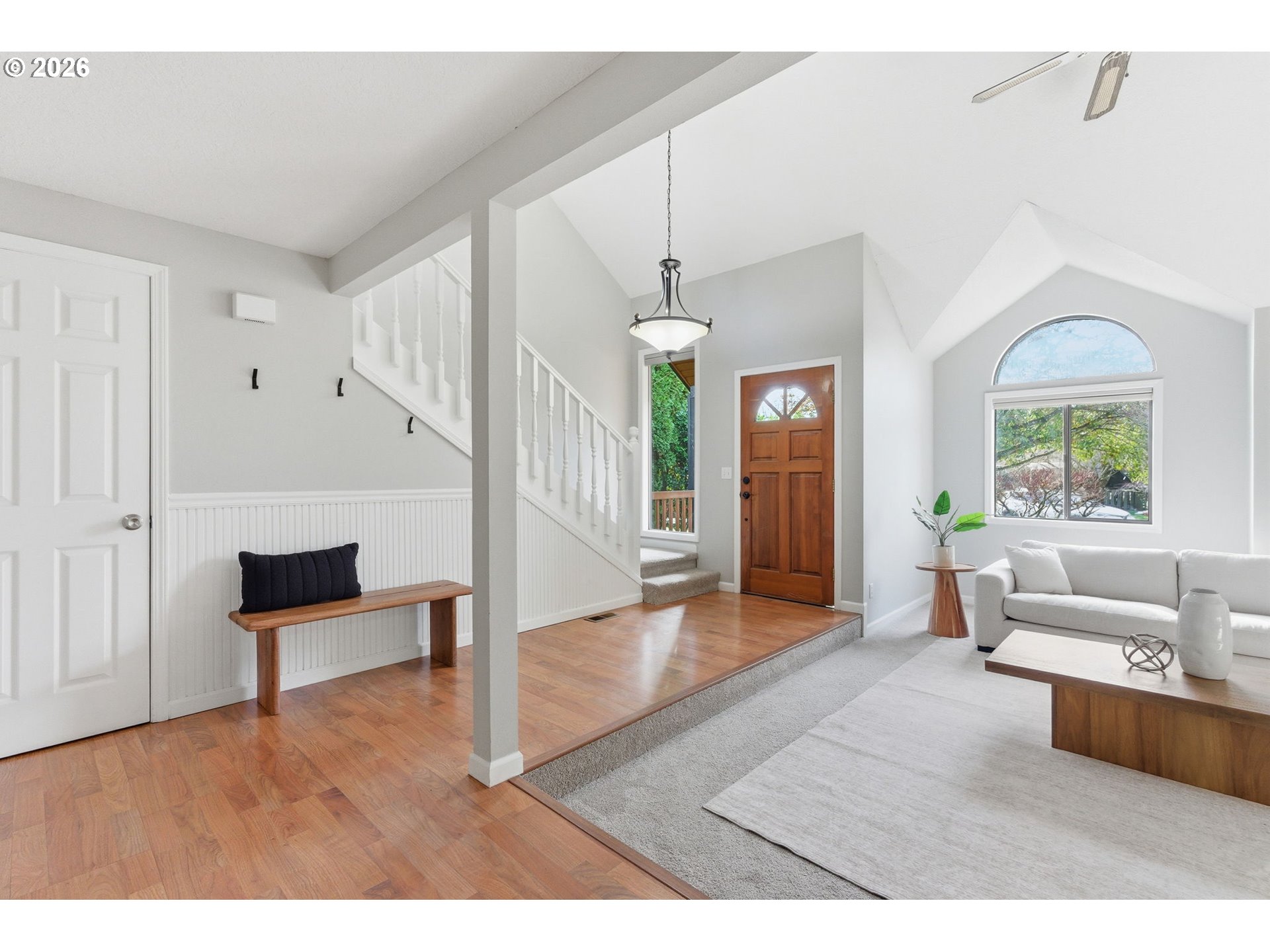 5585 Northwest Peregrine Place Portland, OR 97229 - Photo 6 of 47 a living room with furniture and a large window