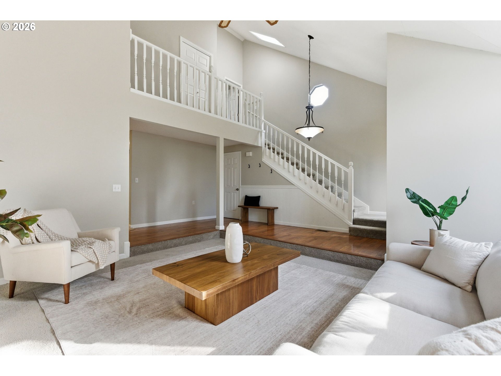 5585 Northwest Peregrine Place Portland, OR 97229 - Photo 8 of 47 a living room with furniture and wooden floor