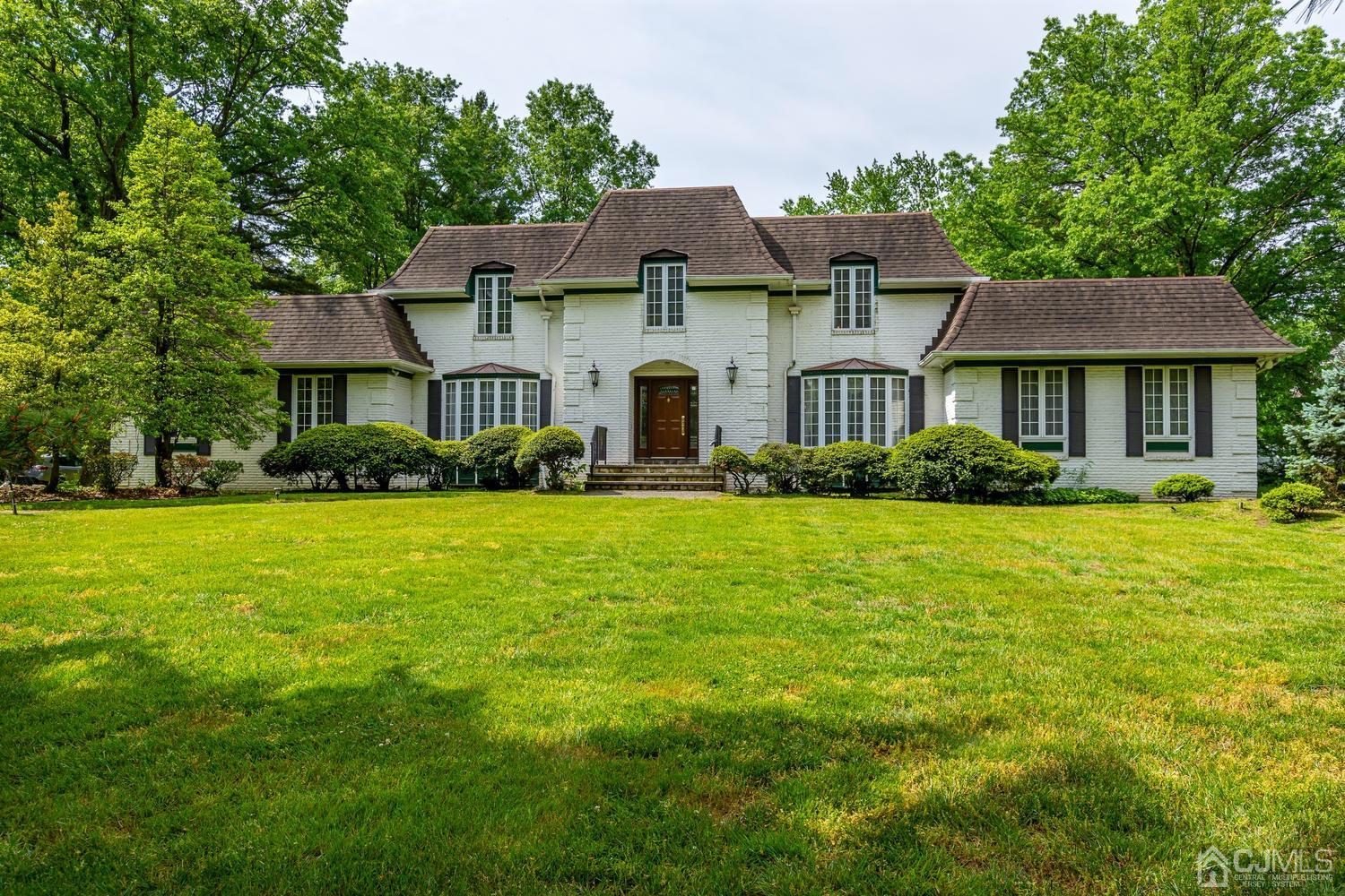 355 New Dover Road Colonia, NJ 07067 - Photo 1 of 45 a front view of a house with a yard