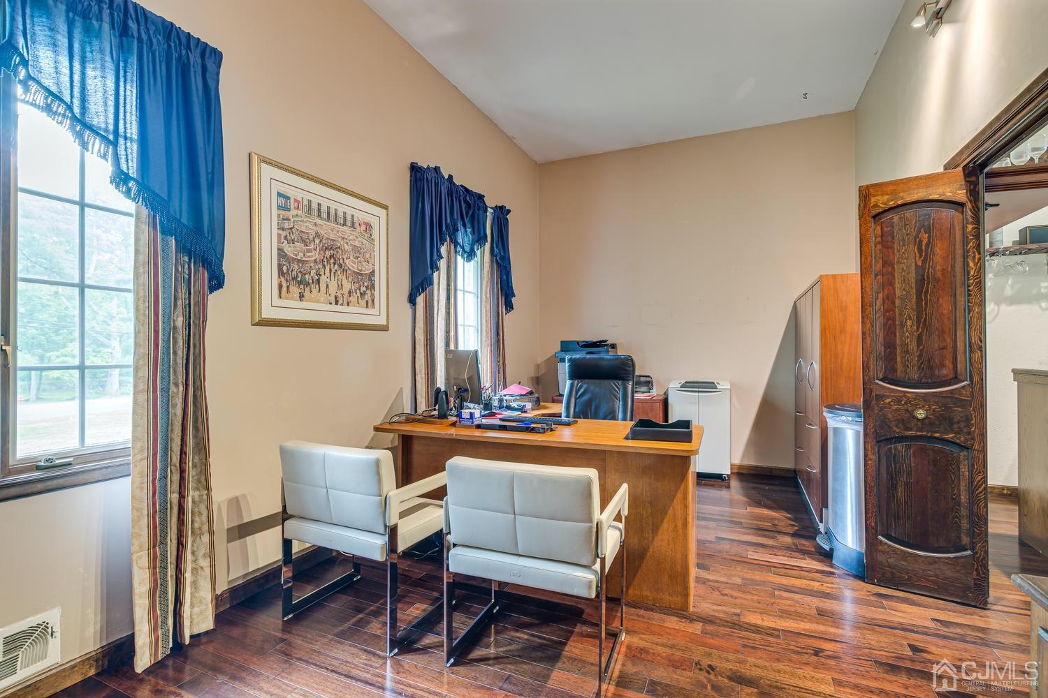 355 New Dover Road Colonia, NJ 07067 - Photo 22 of 45 a dining room with furniture and window