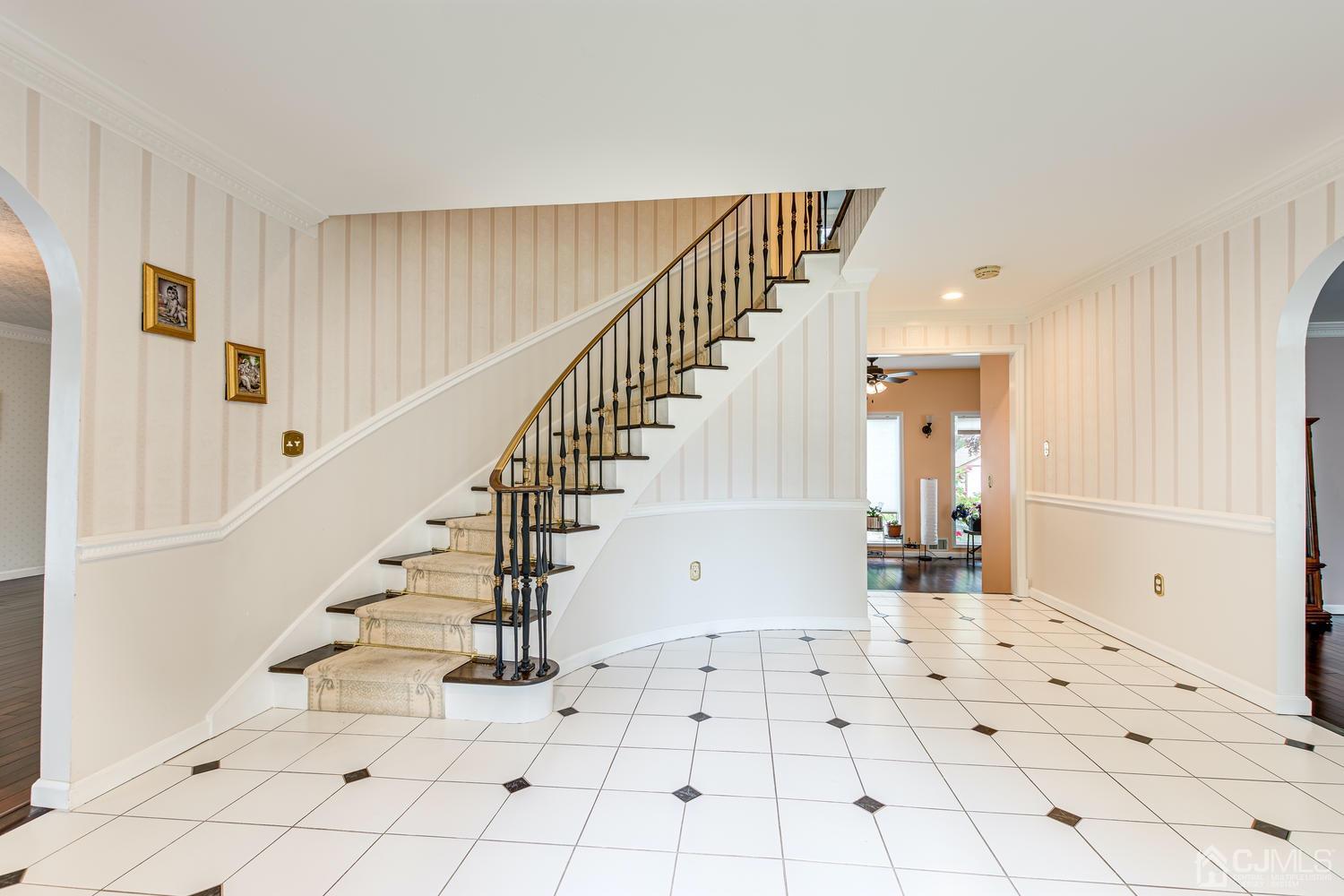 355 New Dover Road Colonia, NJ 07067 - Photo 5 of 45 a view of entryway with wooden floor