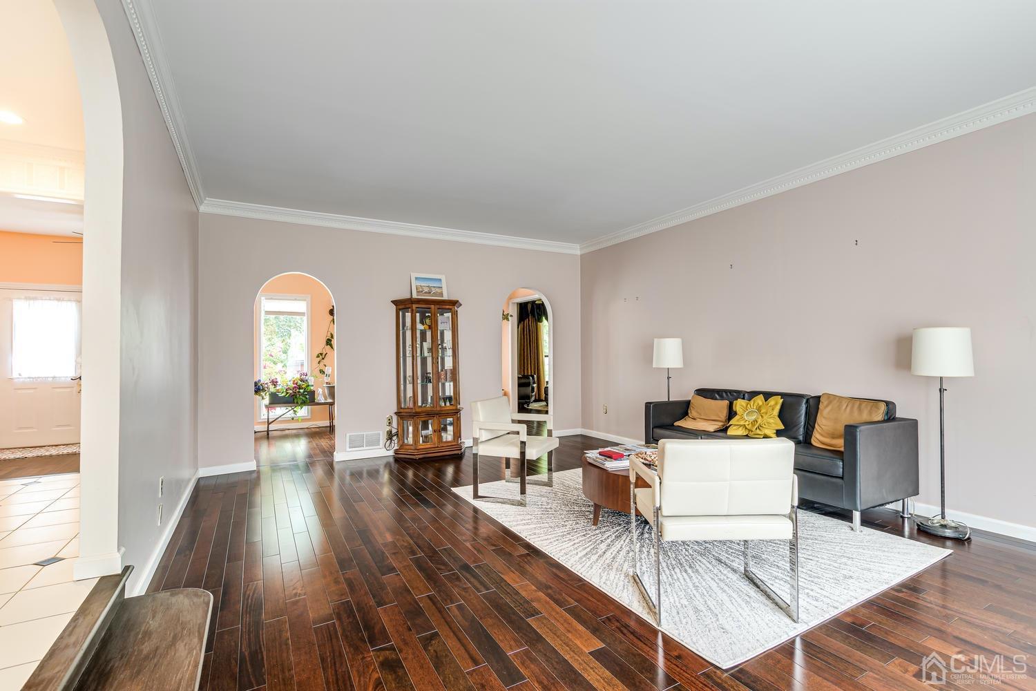 355 New Dover Road Colonia, NJ 07067 - Photo 6 of 45 a living room with furniture and wooden floor