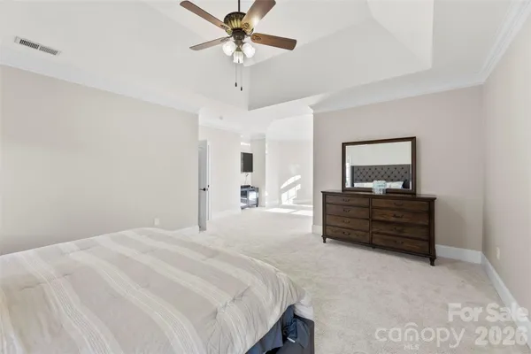 a bedroom with a bed and a closet