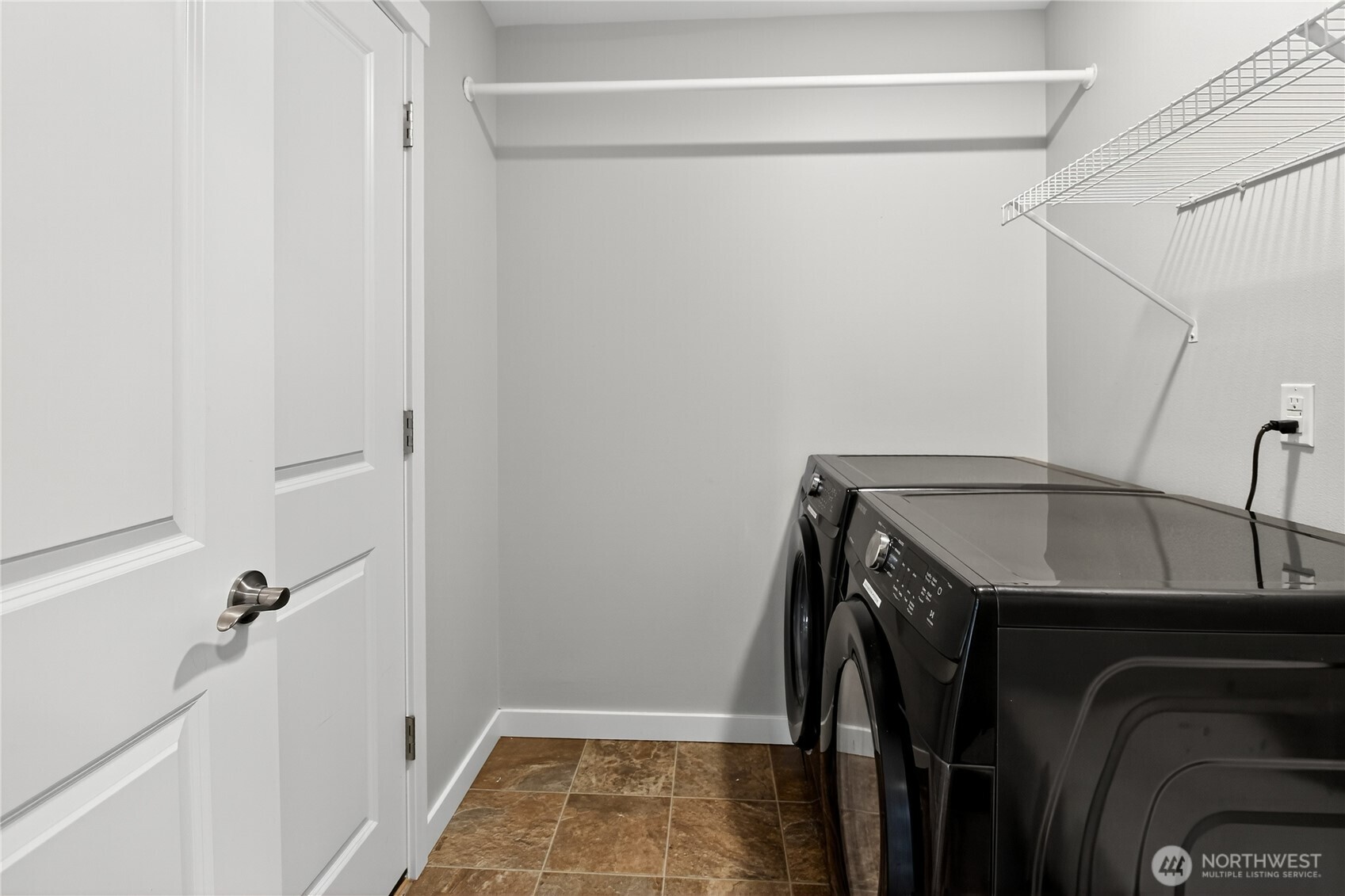 25900 243rd Avenue Southeast Maple Valley, WA 98038 - Photo 17 of 23 a bathroom with a sink and washing machine