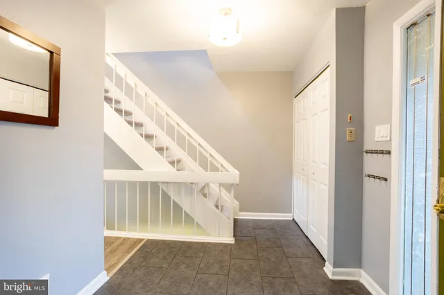 a view of an entryway with staircase