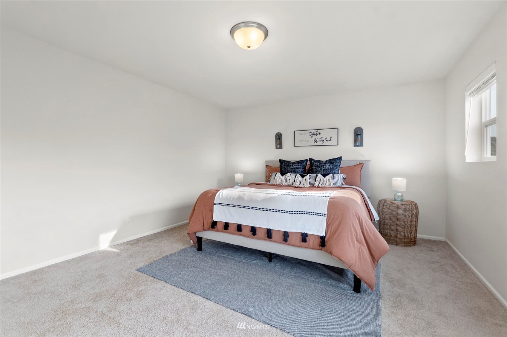 4139 Everett Avenue Tacoma, WA 98404 - Photo 11 of 23 a bed room with a bed and a night stand