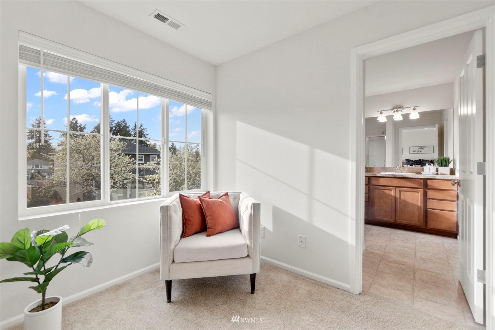 4139 Everett Avenue Tacoma, WA 98404 - Photo 12 of 23 a living room with furniture and a potted plant