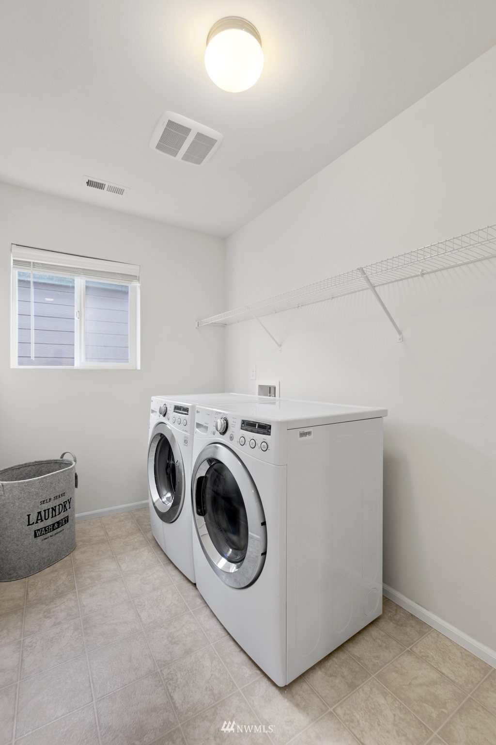 4139 Everett Avenue Tacoma, WA 98404 - Photo 15 of 23 a utility room with dryer and washer