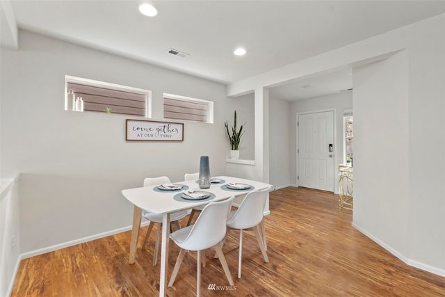 a view of a dining room with furniture