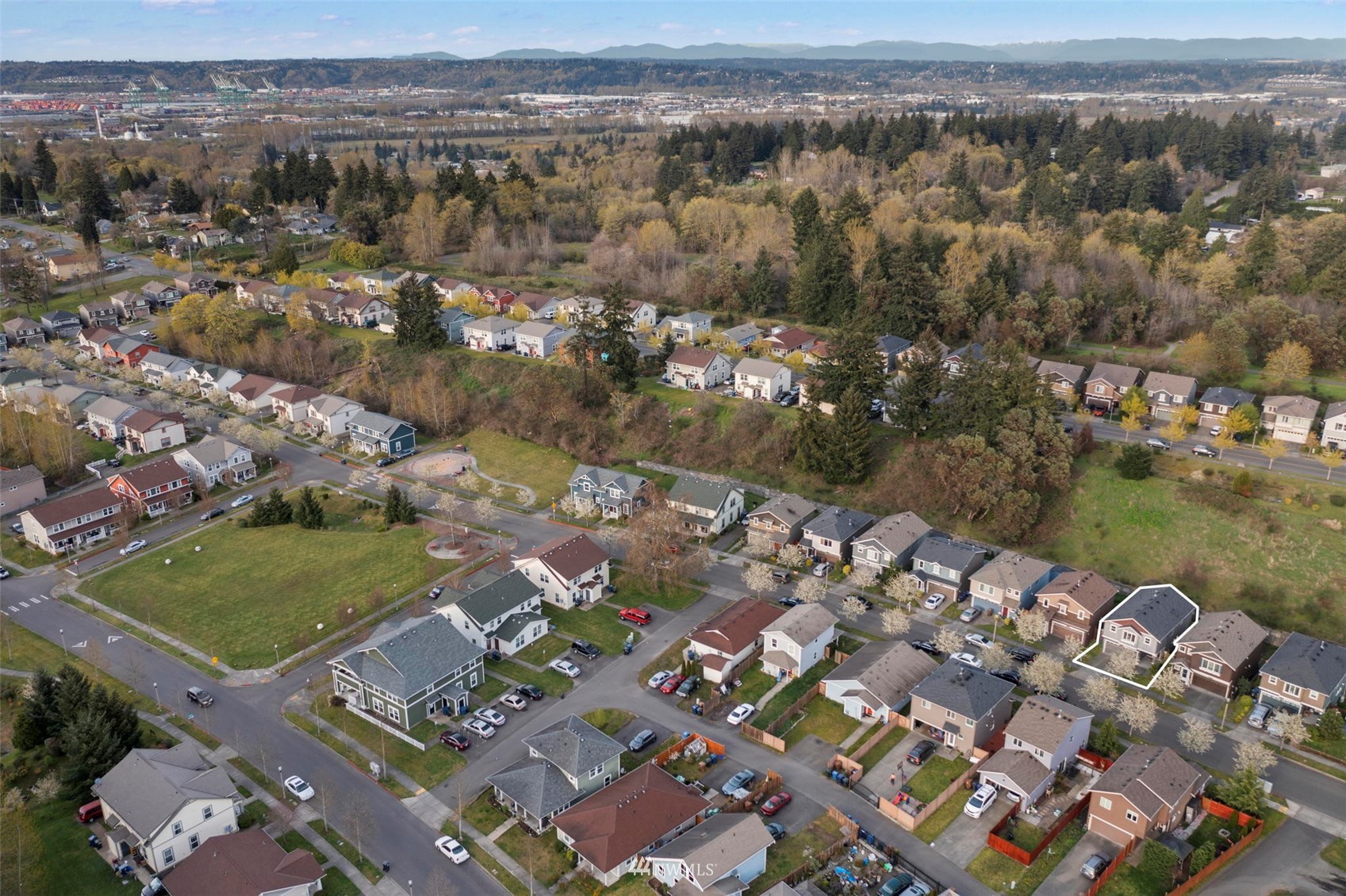 4139 Everett Avenue Tacoma, WA 98404 - Photo 22 of 23 an aerial view of a city with mountains