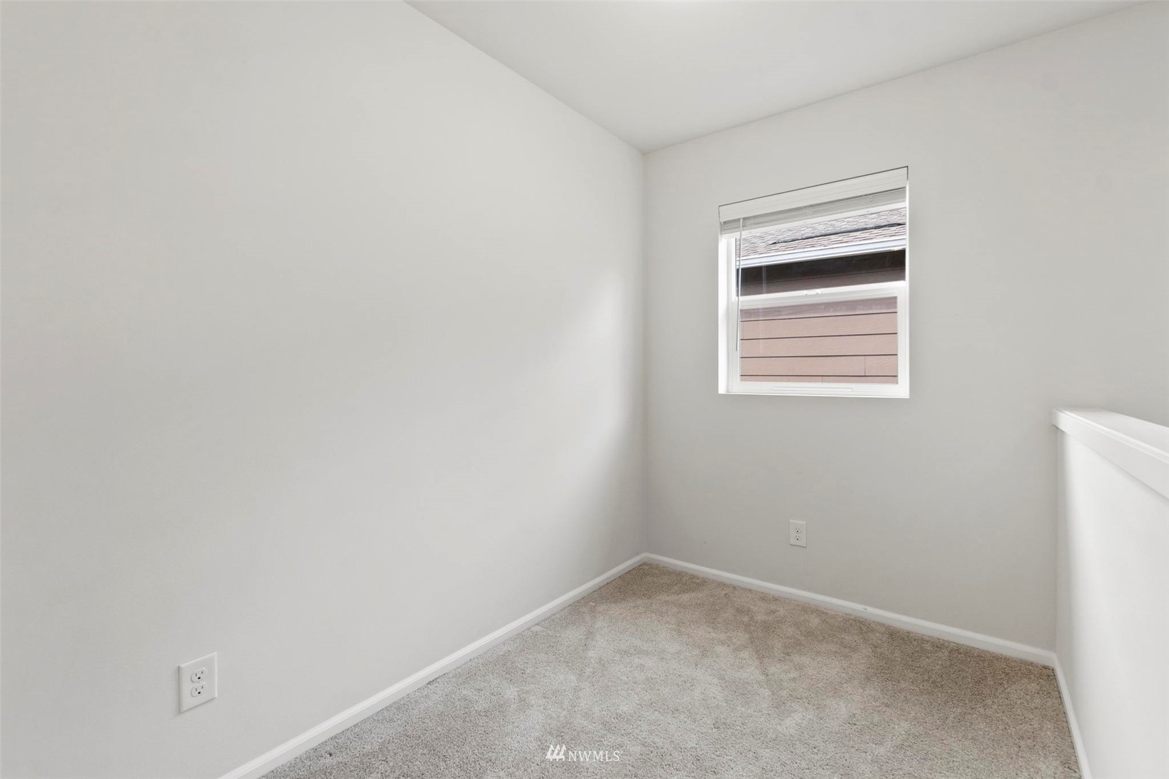 4139 Everett Avenue Tacoma, WA 98404 - Photo 9 of 23 a room that has a window in it