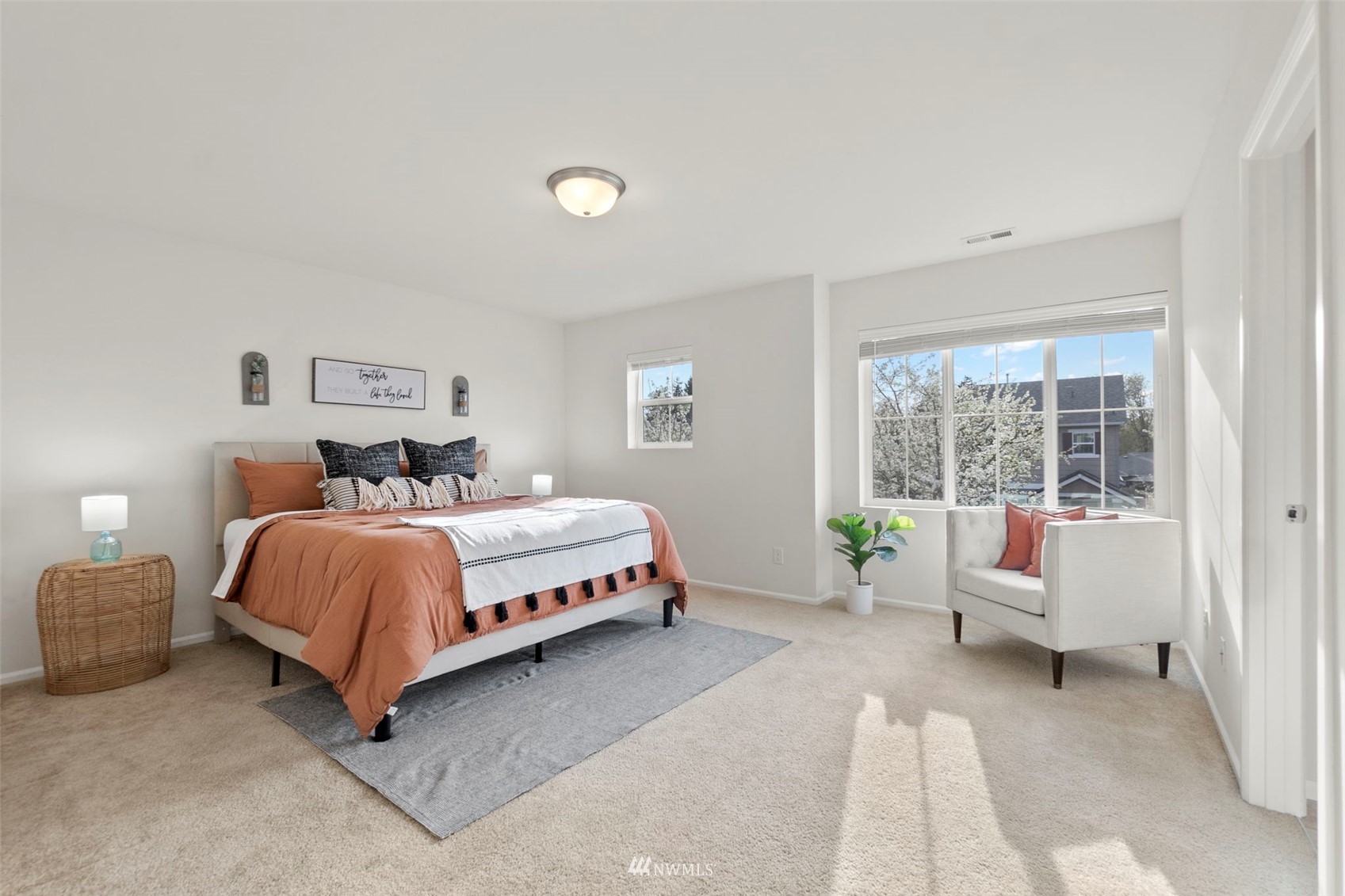 4139 Everett Avenue Tacoma, WA 98404 - Photo 10 of 23 a bedroom with a bed and a couch