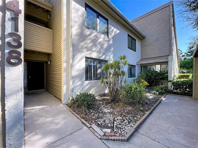 an aerial view of a city with lots of residential buildings