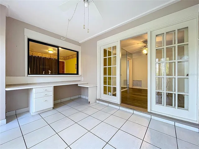 a view of an empty room with a window