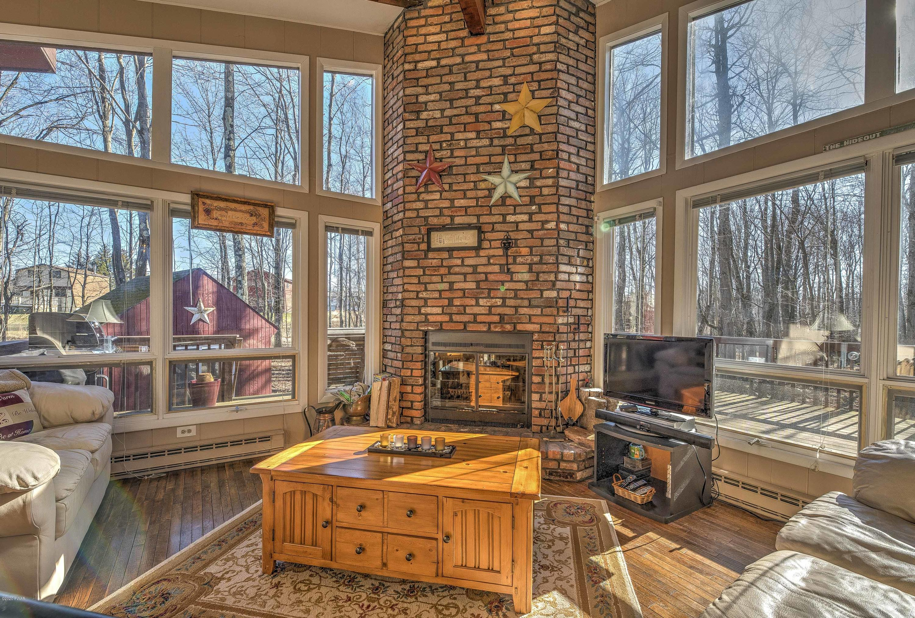 2664 Rockway Road Lake Ariel, PA 18436 - Photo 14 of 33 Living room, featuring brick fireplace