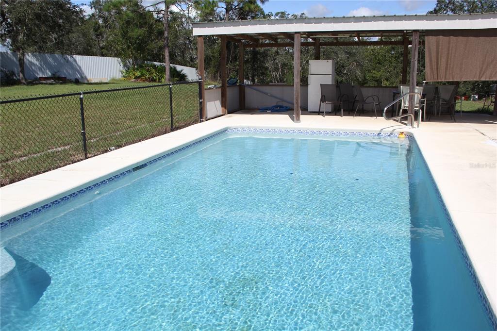 13127 Star Road Brooksville, FL 34613 - Photo 5 of 54 a view of a backyard