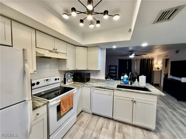 $135,000 | 2133 Golfside Village Drive, Lehigh Acres, FL 33936