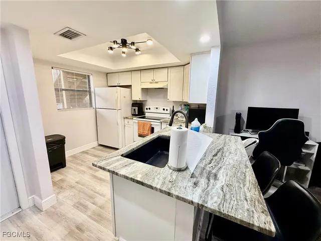 $135,000 | 2133 Golfside Village Drive, Lehigh Acres, FL 33936