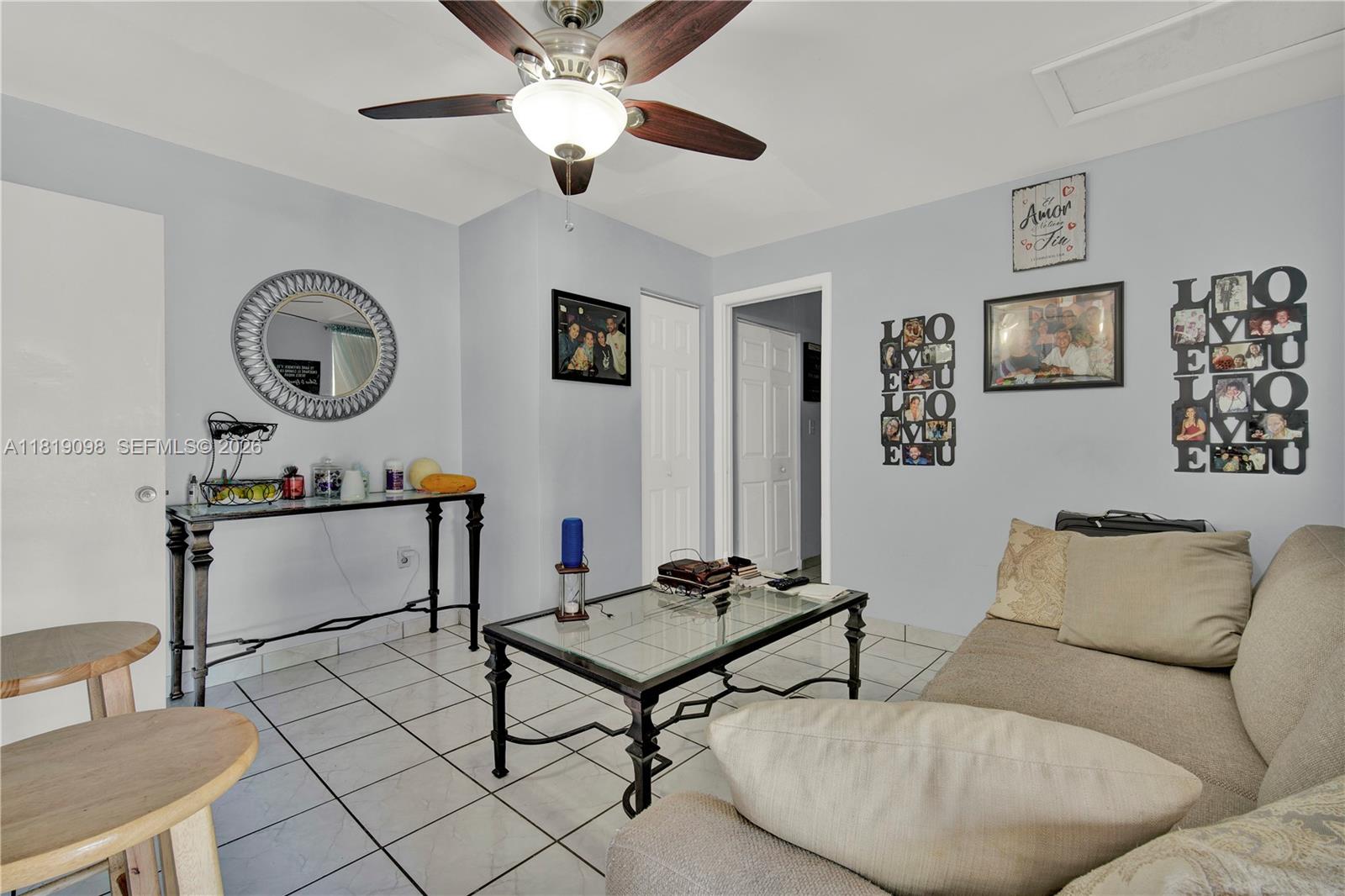 829 Southwest 19th Avenue Miami, FL 33135 - Photo 24 of 54 a living room with furniture and a table