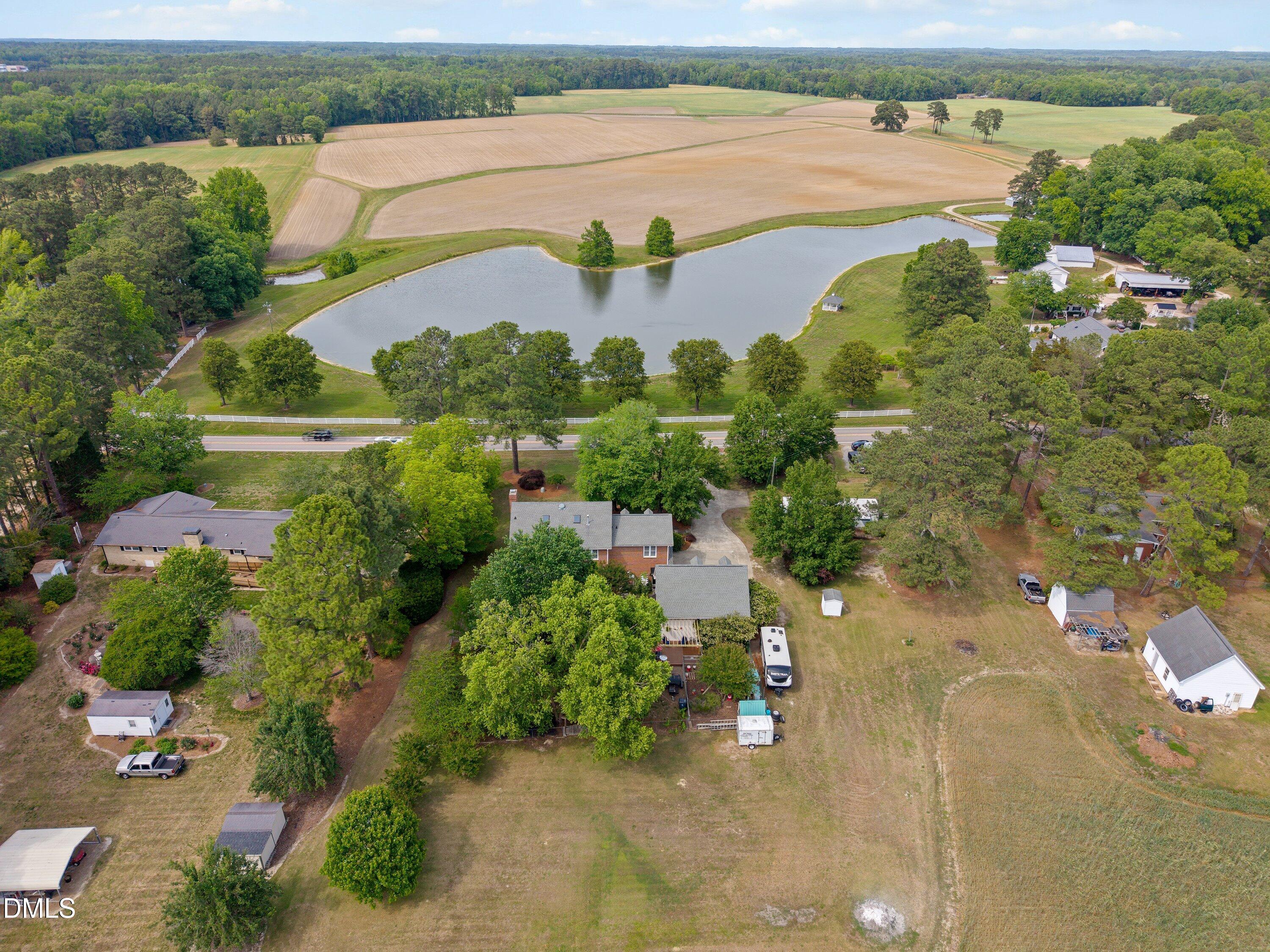 6612 Fowler Road Zebulon, NC 27597 - Photo 41 of 42 an aerial view of ocean with residential house with outdoor space and seating