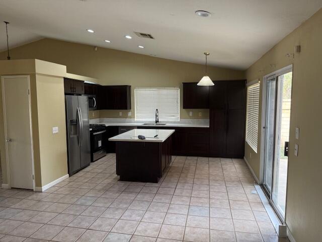 49084 Violet Street Indio, CA 92201 - Photo 1 of 14 a kitchen with stainless steel appliances a refrigerator and a sink