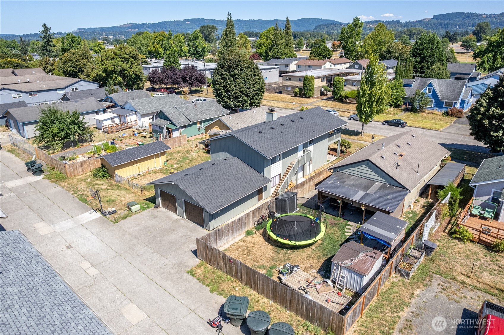 823 8th Avenue Longview, WA 98632 - Photo 12 of 18 an aerial view of a house with garden space and street view