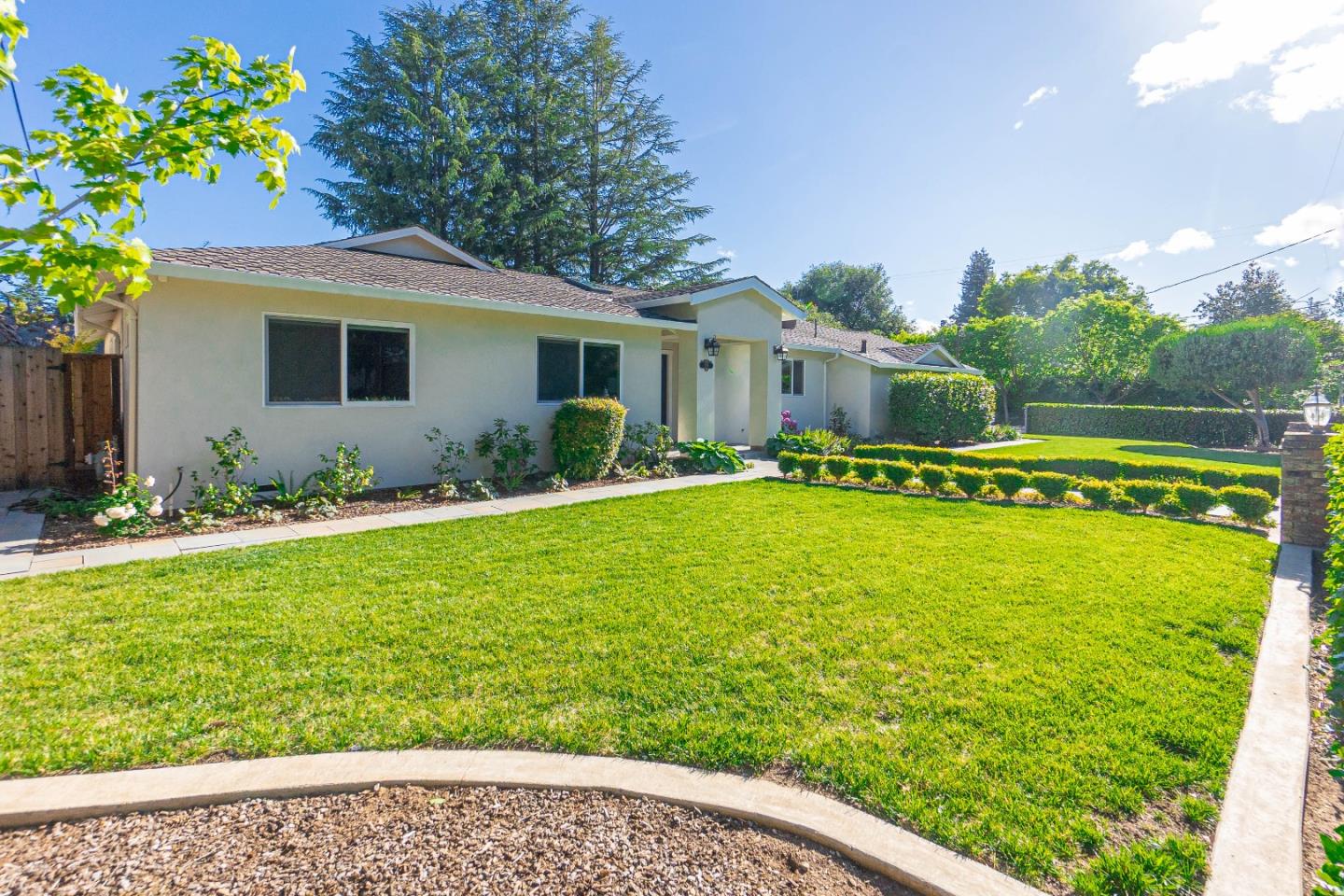 928 Manor Way Los Altos, CA 94024 - Photo 2 of 41 a view of a house with a yard
