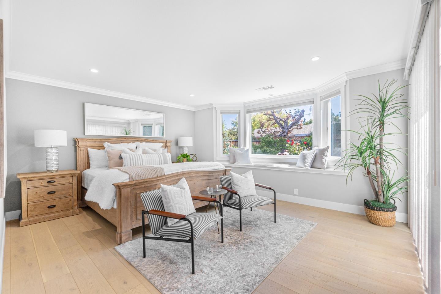 928 Manor Way Los Altos, CA 94024 - Photo 25 of 41 a bedroom with furniture and a large window