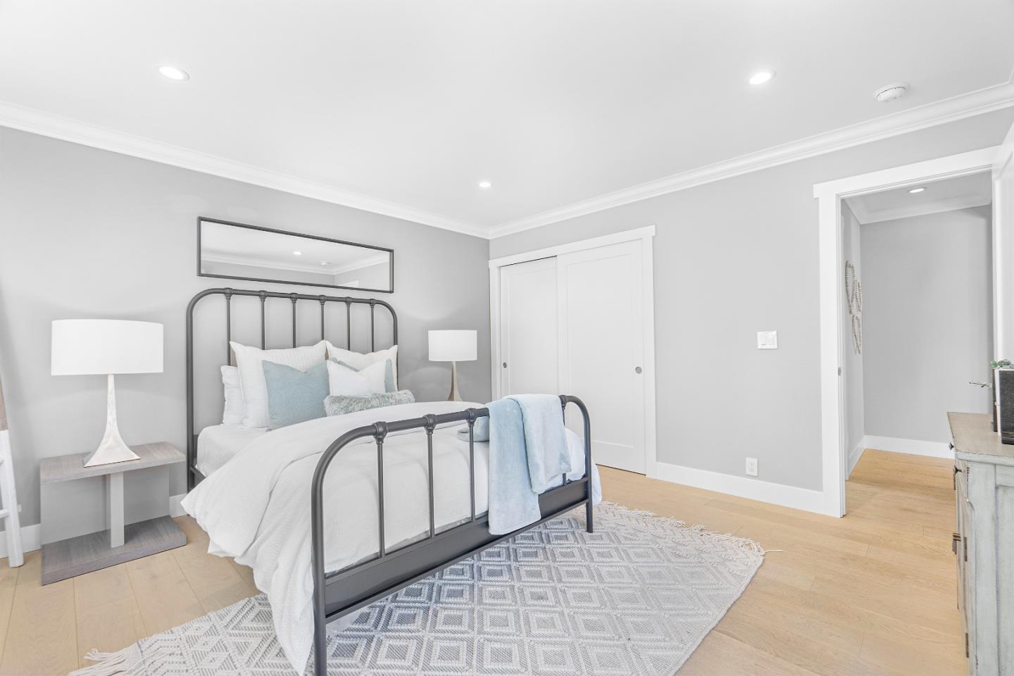 928 Manor Way Los Altos, CA 94024 - Photo 36 of 41 a bedroom with a large bed and a rug