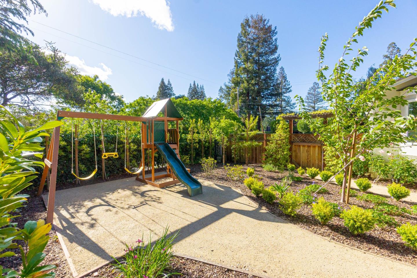 928 Manor Way Los Altos, CA 94024 - Photo 39 of 41 a view of a backyard with plants and patio