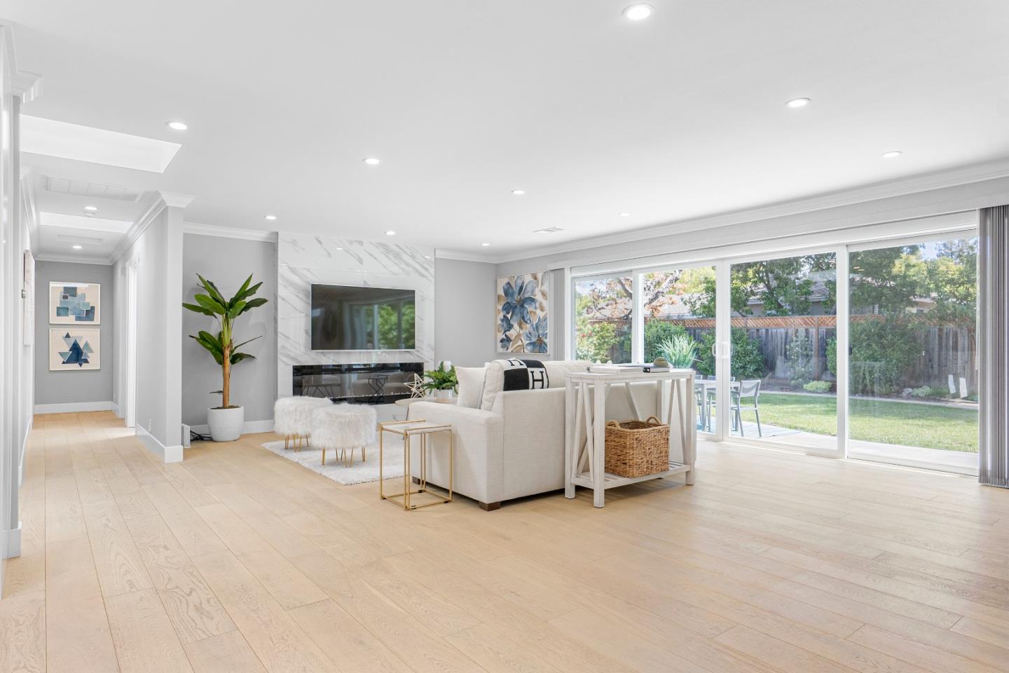 928 Manor Way Los Altos, CA 94024 - Photo 10 of 41 a living room with furniture and a flat screen tv