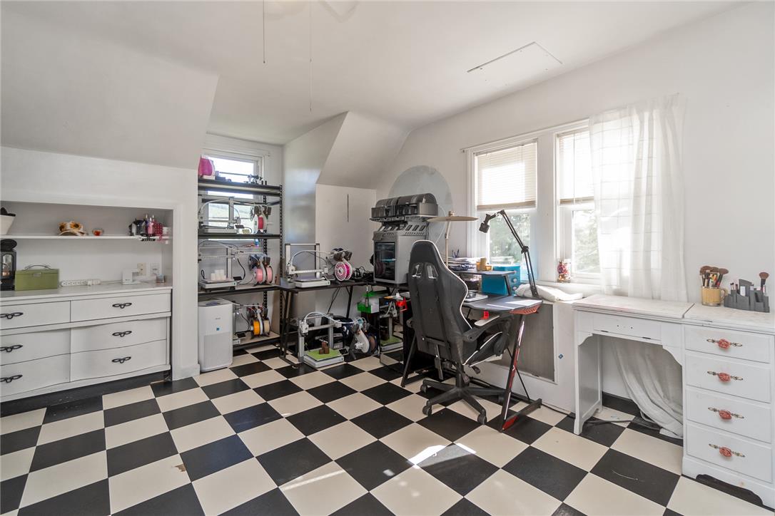 331 East Lizard Creek Road Lehighton, PA 18235 - Photo 34 of 37 Sun-filled workroom and a charming checkered floor, ideal for creative pursuits.